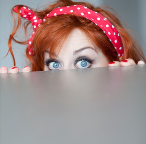 Woman Hiding Behind Table